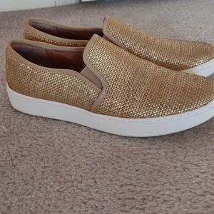 Gold woven slip on sneakers